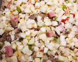 A picture of step 4 of Meat Lovers Potato O’Brian Breakfast Casserole 🥘.