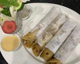 A picture of step 11 of Tawa chicken chutney roll.