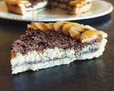 Foto del passaggio 16 della ricetta Crostata con frolla di banane e crema nocciolata