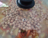 Foto del paso 7 de la receta: Atún con papas y garbanzos al wok