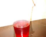A picture of step 2 of Home made grenadine syrup.