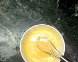 A picture of step 2 of Shahi mango khandvi with Mango rabari.