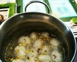 A picture of step 5 of Tasty Rasagulla used by leftover Rice.