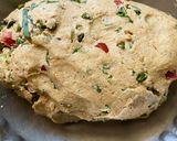 A picture of step 1 of Spring onion mix flour Thalipith.