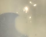 A picture of step 3 of Milk and coconut milk pudding.