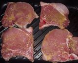 Foto del paso 4 de la receta: Costillitas de cerdo con salsa de miel y naranja
