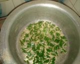 A picture of step 3 of Turmeric rice and peas.
