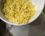 A picture of step 14 of Dumplings With Noodles Soup.