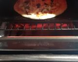 A picture of step 7 of Chicken tikka pizza.