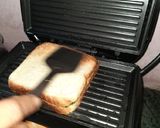 A picture of step 4 of Alumutter spinach cheese sandwich.