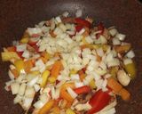 A picture of step 7 of Apple and pear chicken tikka stir fry with rice.