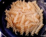 A picture of step 4 of Crispy Edible Diyas filled with Pasta Chat.