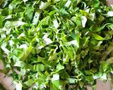A picture of step 1 of Water Spinach Chilla.