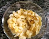 A picture of step 4 of Mango pickle with asafoetida.