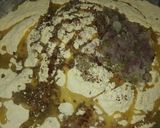 A picture of step 4 of Besni masala prahta with tomato souce.