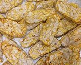 Hình bước làm 1 của món Tempeh đậu gà, nấm đùi gà sốt bơ tỏi