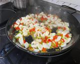Foto del paso 4 de la receta: Paella con sepia y gambón