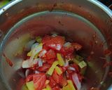 A picture of step 2 of Rich Tomato and Pumpkin Soup.