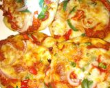 A picture of step 8 of Mini pizzas.