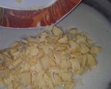 A picture of step 2 of White Chocolate Chewy Cranberries And Pistachio Fudge.