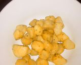 A picture of step 4 of Roasted potatoes and coated smokies.
