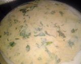 A picture of step 2 of Spinach kathi roll in fishbone wrap with red souce pasta.