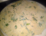 A picture of step 2 of Spinach kathi roll in fishbone wrap with red souce pasta.