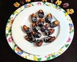 A picture of step 4 of Walnuts in Dates Dipped In Chocolate.