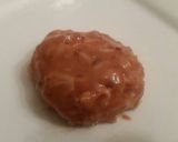 A picture of step 5 of Frozen Coconut Cookie w/ Warm Plum Sauce.
