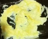 A picture of step 1 of Cheesy Scrambled Egg Sandwich With Black Tea.