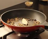 A picture of step 1 of Thalassery Chicken Biryani.