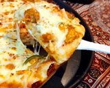 A picture of step 7 of Chicken tikka creamy pizza.