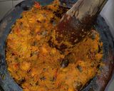 A picture of step 3 of Banga soup with fresh cat fish and beef.