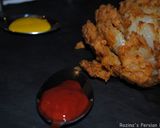 A picture of step 21 of Deep fried blooming onion.
