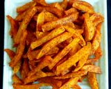A picture of step 5 of Masala french fries.