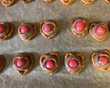 A picture of step 3 of Rolo and Pretzels Christmas treats.