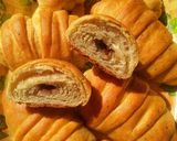 A picture of step 8 of Spicy croissants with chocolate filling.