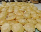 A picture of step 6 of Panipuri (7 types of water with 4 flavour  of  puries).