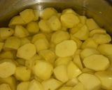A picture of step 1 of Fried potatoes with carrot and tomato salad #allstarcontest.