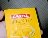 A picture of step 4 of Cardamom lemon green tea.