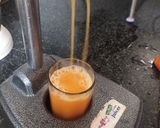 A picture of step 1 of Orange Blueberry Punch.