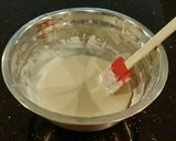 A picture of step 5 of Almond Layer Cake with Rasberry Cream Filling.