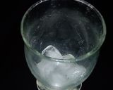 A picture of step 6 of Appletini.