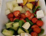 A picture of step 1 of My Melon & Strawberry Salad with Raspberry Balsamic vinegar. 😙.