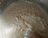 A picture of step 4 of Chocolate chip and raisins white forest block cake.