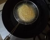A picture of step 4 of Spaghetti Nest with Drumsticks.