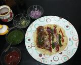 A picture of step 13 of Veg Frankie Roll.