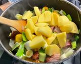 A picture of step 13 of Country Soup with Leeks, Carrots, Potatoes, and Bacon.