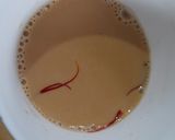A picture of step 4 of Saffron cardamom tea.