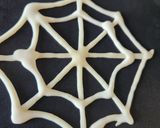 A picture of step 2 of Halloween Spiders And Chocolate Vanilla Eggless Spiderweb Pancake.